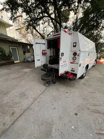 Magnet Plumbing service vehicle on-site for Water Heater Repair in Miami Beach